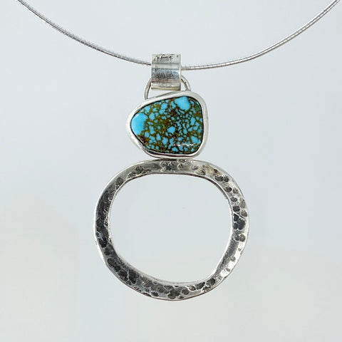 Wonky oval silver pendant with turquoise