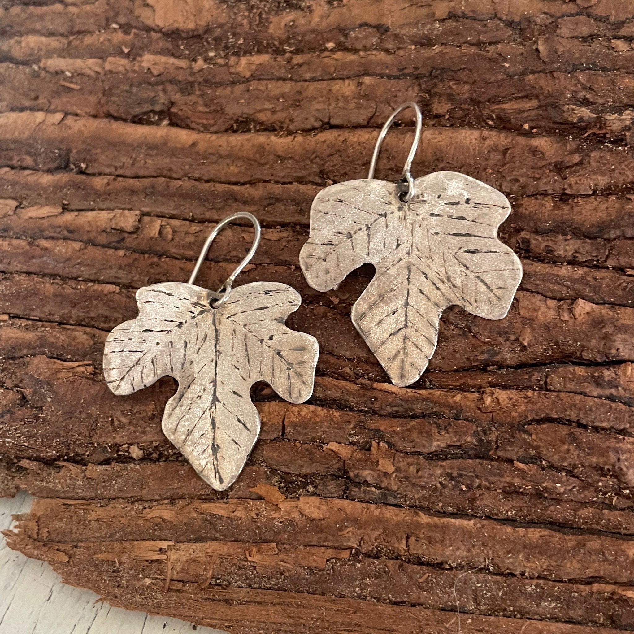 Silver fig leaf earrings