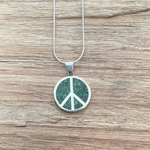 Turquoise sterling peace pendant