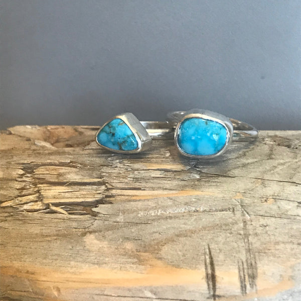 Triangular and rectangular house  cut turquoise rings side by side.  Each ring is sold separately. 