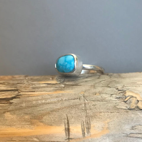 Small House cut turquoise ring with high setting and a thin band.  size 8.25