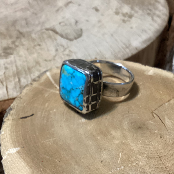 Silver ring with a big turquoise